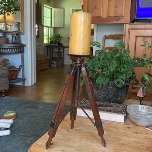 Restoration Hardware candlestick holder as  mock surveyor’s tool. Vintage.
